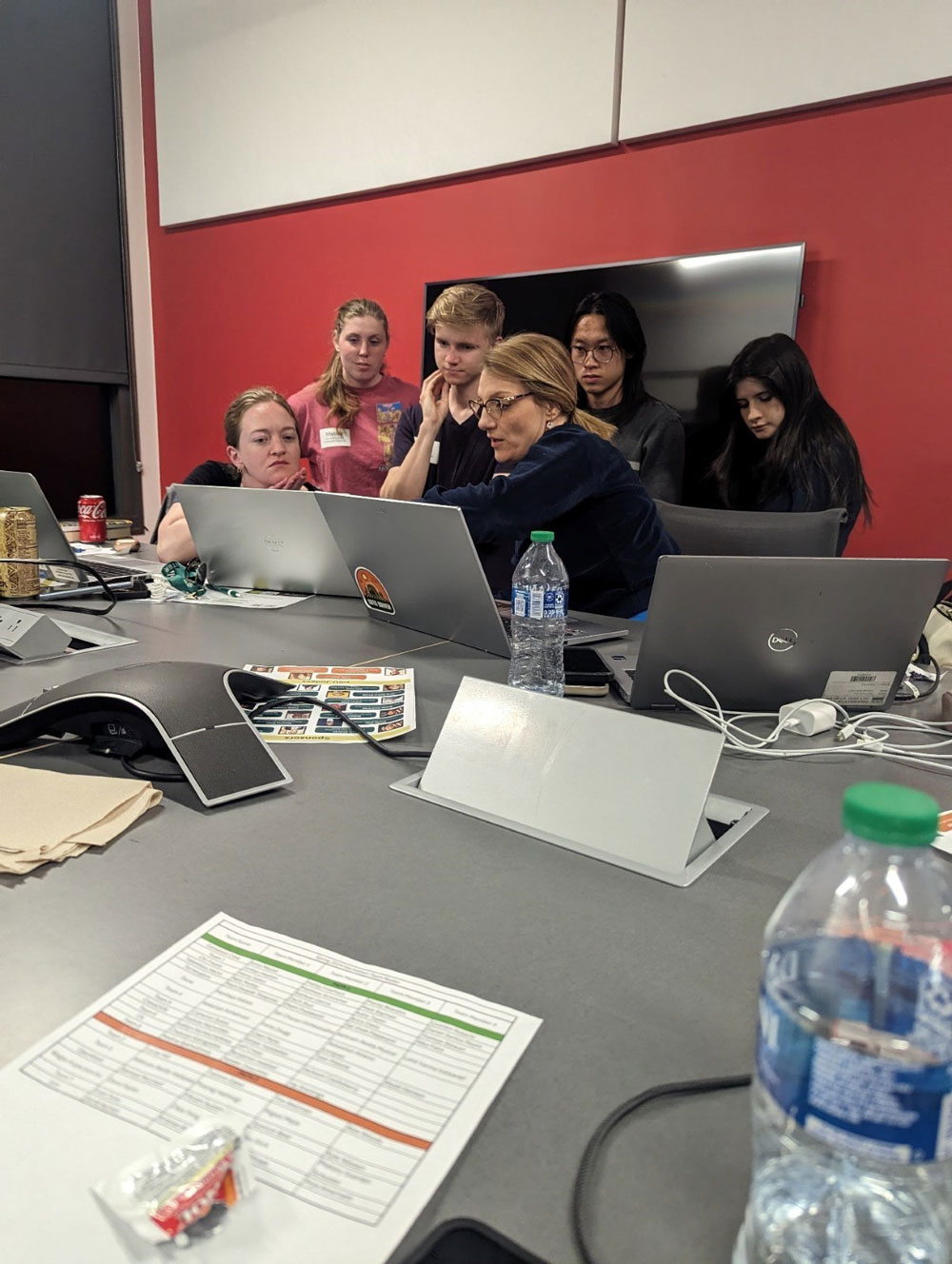 FSIS statistician Anna Steers-Smith and US Digital Corps fellow Veronica Swanson helping a team with a programming question