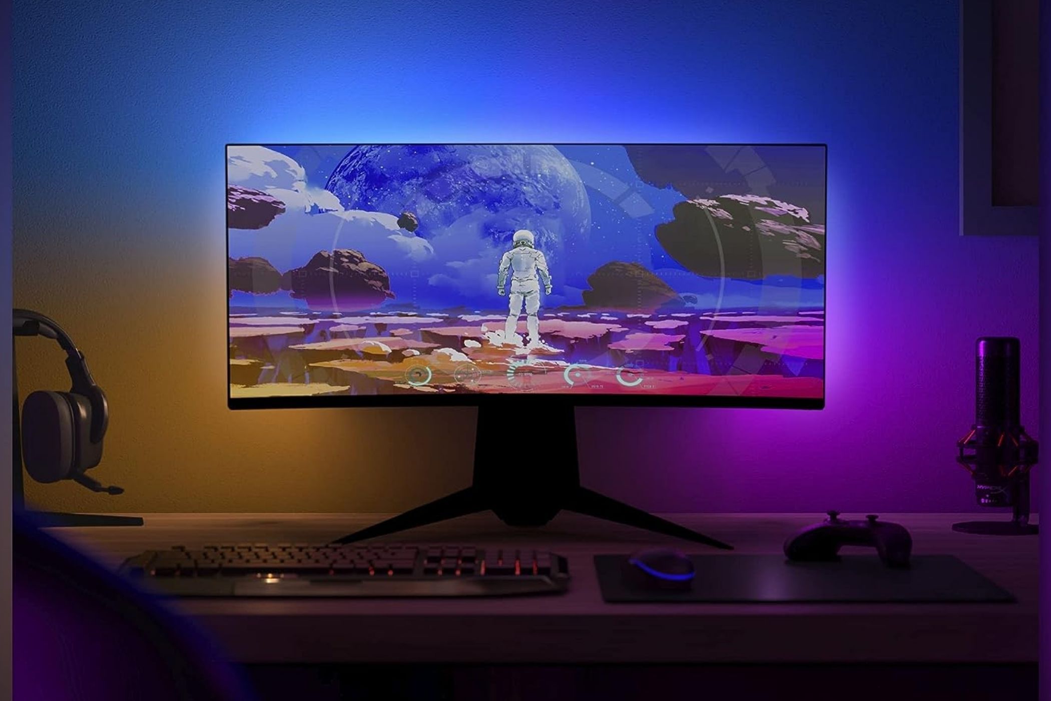 An image showing a gaming monitor with Philips Hue Play Gradient light strip.