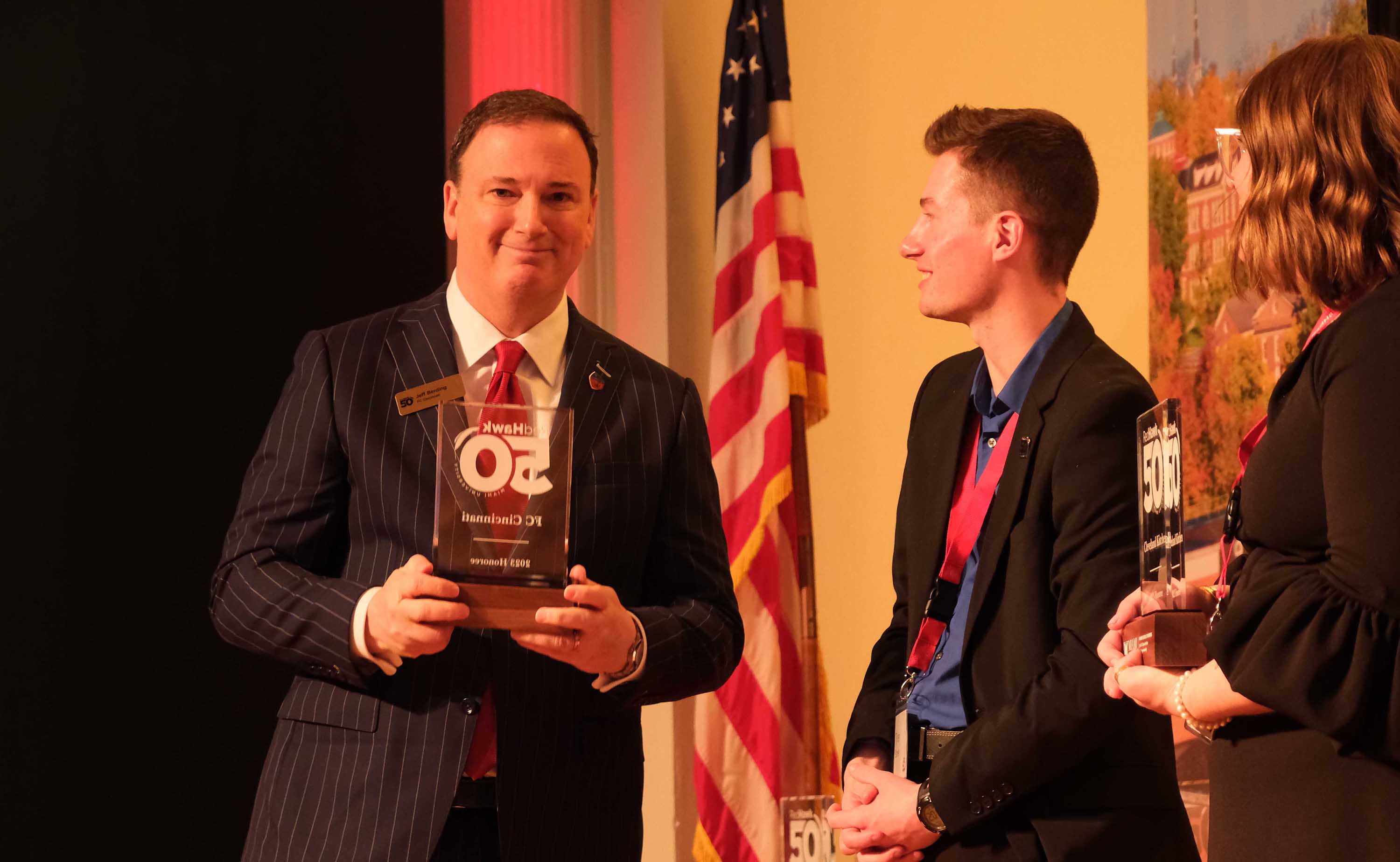 Jeff Berding poses with his award