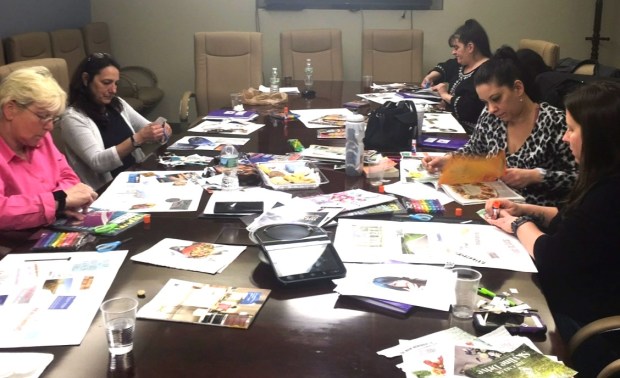 Women at one of Erin Logan's REVIVE workshops making vision boards. (COURTESY ERIN LOGAN)