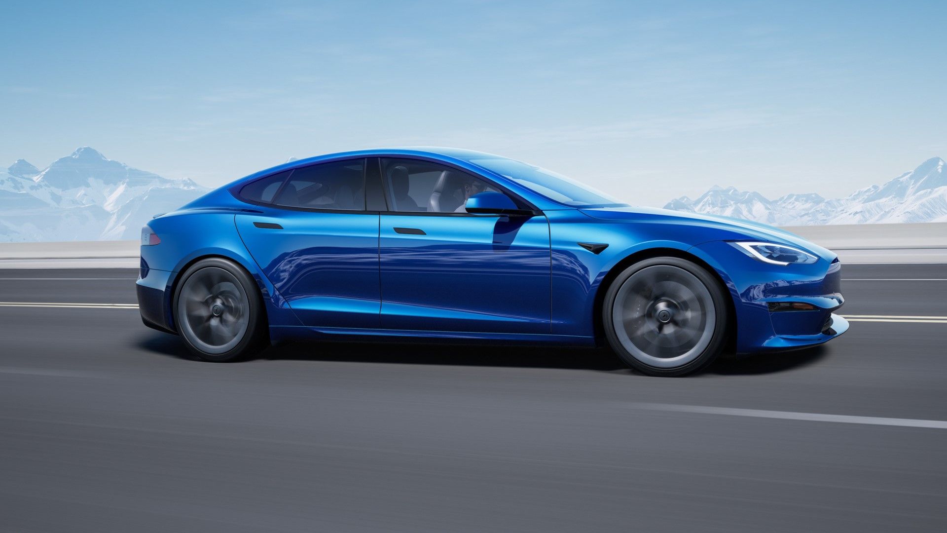 Blue Tesla Model S driving