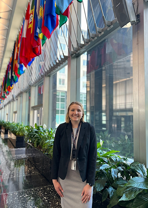 IU Bloomington senior Kathryn Riordan stands in the hall of flags inside the Harry S. Truman Building in Washington, D.C., during her sum...