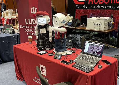 Two small robots on a display table