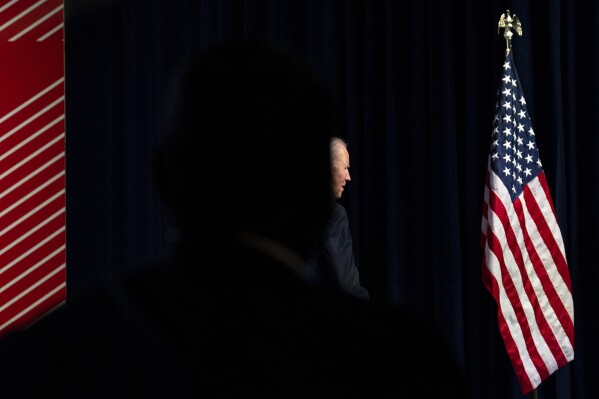 FILE - President Joe Biden exits the stage following a political rally at the Philadelphia Convention Center in Philadelphia, Saturday, June 17, 2023. A Democratic strategist close to the Biden campaign who was not authorized to speak publicly, said the campaign continues to use AI to model and build audiences, draft and analyze email copy and generate content for volunteers to share in the field, but officials insisted their experimentation begins with a set of ethical standards that outlines what they won’t do, including misleading voters, spreading disinformation and so-called deepfakes, deliberately manipulated images, or using AI-generated content without a staff member’s review. (AP Photo/Joe Lamberti, File)