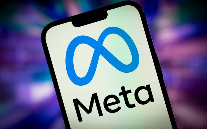 The Meta logo displayed on a smartphone.