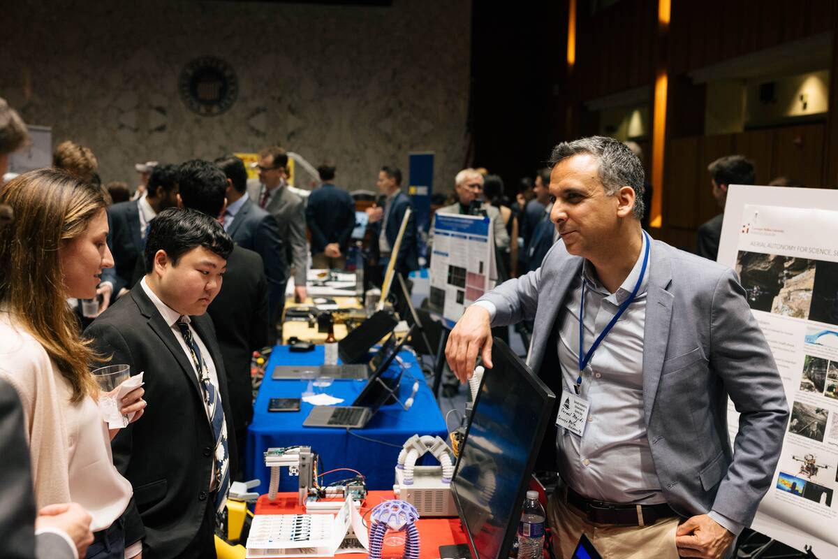  Carmel Majidi shows robots from the Soft Machines Lab to Congressional staffer