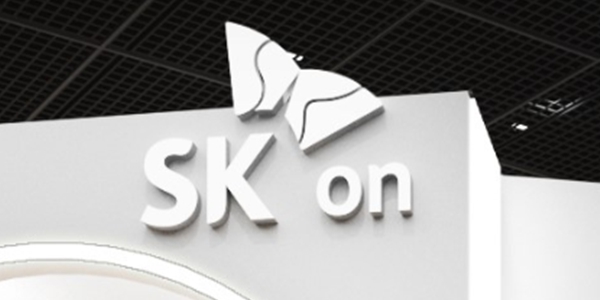 A white rendition of the SK on logo