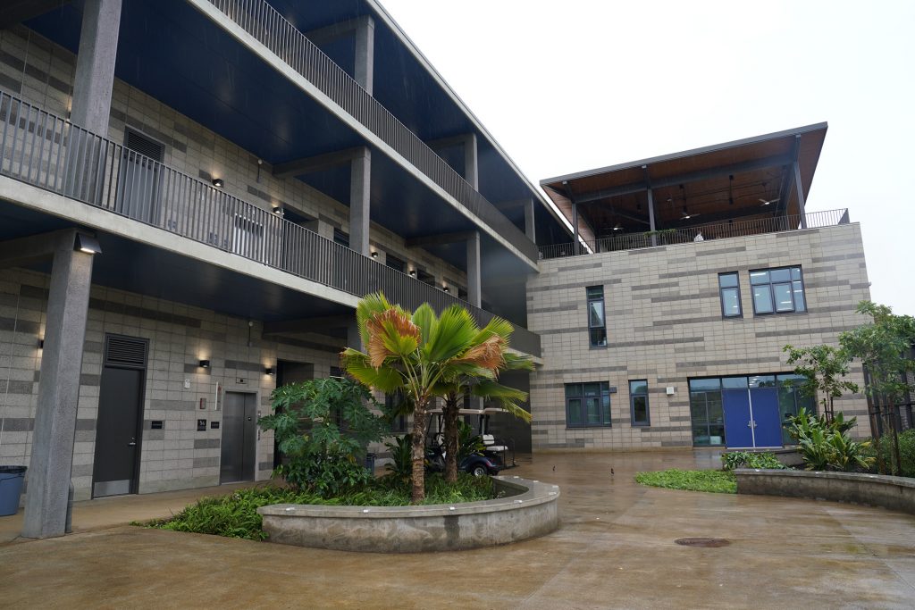 The blessing of the Waipahu High School Integrated Academy Learning Center takes place Friday, Dec. 1, 2023, in Waipahu. The center offers students the opportunity to learn trades and skills. (Kevin Fujii/Civil Beat/2023)