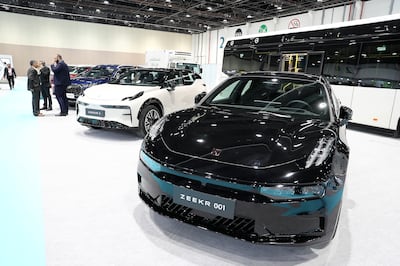 Electric cars on display at the Electric Vehicle Innovation Summit held at ADNEC in Abu Dhabi. Pawan Singh / The National