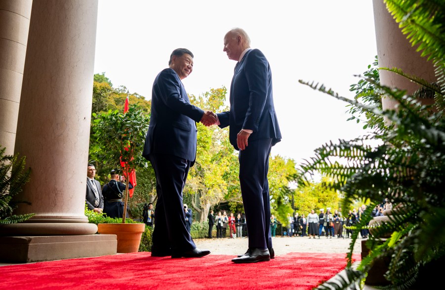 FILE -President Joe Biden, right, greets China's President President Xi Jinping, left, at the Filoli Estate in Woodside, USA, Wednesday, Nov. 15, 2023. High-level envoys from the United States and China are set to meet in Geneva for talks about artificial intelligence including the risks of the technology and ways to set shared standards to manage it. The meeting Tuesday is billed as an opening exchange of views in an inter-governmental dialogue on AI agreed during a meeting between U.S. President Joe Biden and Chinese President Xi Jinping in San Francisco. (Doug Mills/The New York Times via AP, Pool, File)