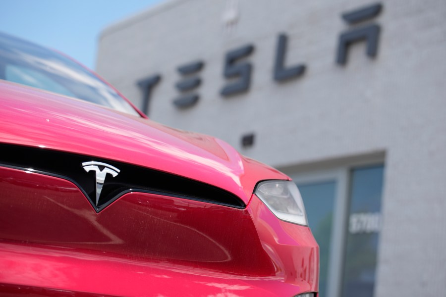 FILE - A Model X sports-utility vehicle sits outside a Tesla store in Littleton, Colo., June 18, 2023. Electric vehicle maker Tesla has begun construction of a factory in Shanghai to make its Megapack energy storage batteries, Chinese state media reported Thursday, May 23, 2024. (AP Photo/David Zalubowski, File)