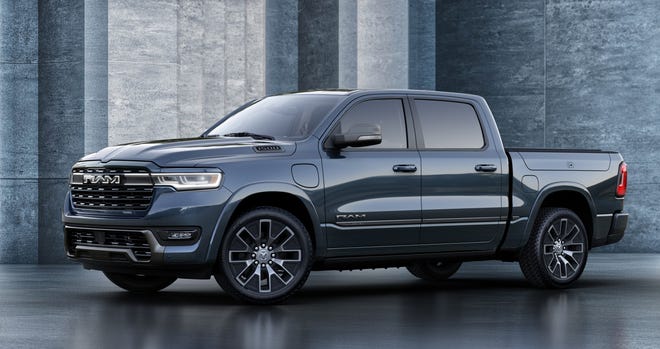 The 2025 Ram 1500 Ramcharger, seen here in the Tungsten trim, runs fully on electricity, but has a gas-powered, on-board generator to recharge the battery on the go.