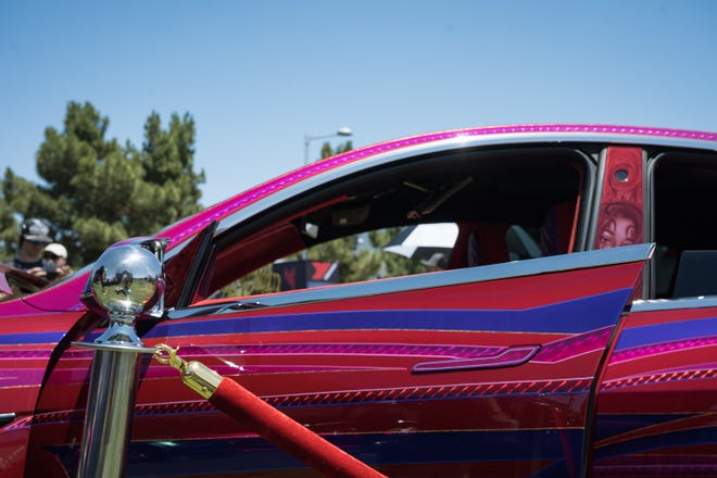 Customized electric vehicles display at the Electrify Expo outside State Farm Stadium on May 4, 2024 in Glendale, Ariz.