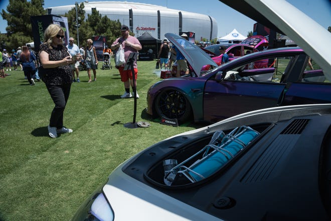 Colby Ashtonâ€™s Tesla is on display at the Electrify Expo outside State Farm Stadium on May 4, 2024 in Glendale, Ariz.