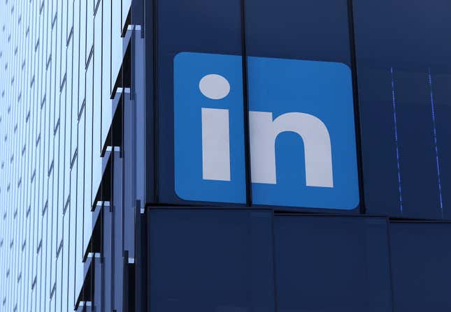 linkedin logo in a window on the side of a building