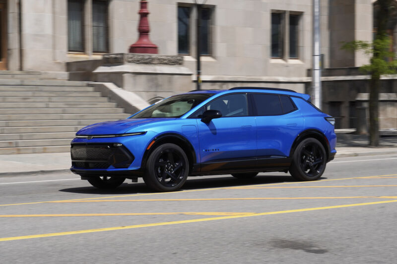 A blue Chevrolet Equinox EV on the street