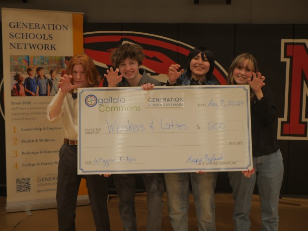 Luka White, Amaya Kneipper, Crystal Ortega and Zach Epperson of Roosevelt High School at the Youth Entrepreneurship Fair. (Courtesy/Generation Schools Network)