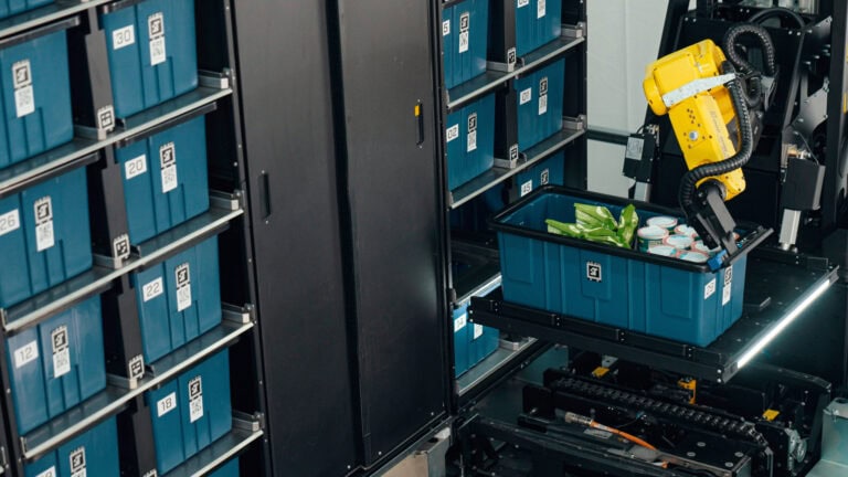 Robots packing orders in an autonomous grocery store. Photo courtesy of 1MRobotics