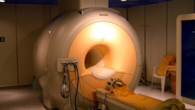 Machine learning enables cheaper and safer low-power MRI