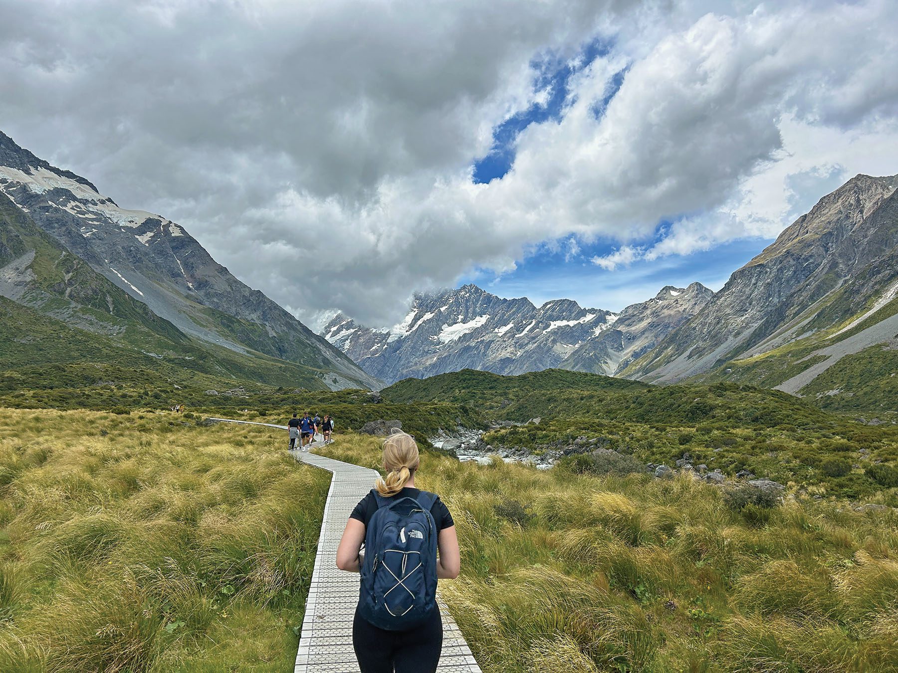 Meghan Walsh '25 hikes toward her classmates at Aoraki/Mount Cook National Park during the Innovation in New Zealand course. Photo by Jules Fromm '25