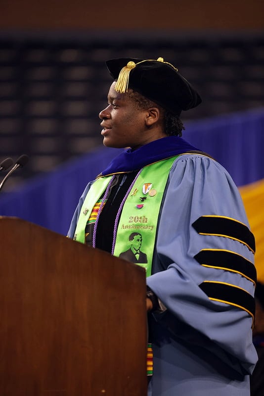 Graduate Student Speaker Oluwami, "Wami," Dosunmu-Ogunbi addresses her fellow graduates at the Michigan Engineering Graduate Student Commencement Ceremony at the Crisler Center in Ann Arbor, on Wednesday, May 1, 2024.