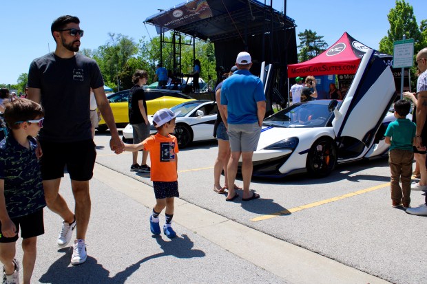 The Glenview Luxury Imports Charity Exotic Car Show for The 100 Club of Illinois, a showcase of 58 of the rarest of automobiles in the world, in an event honoring our first responders. (Gina Grillo)