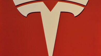 Tesla lays off hundreds of employees on electric vehicle charger team