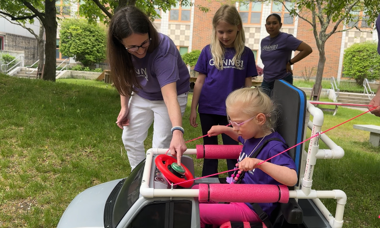 Robotics team gifts customized car to local girl with disabilities Robotics team gifts customized car to local girl with disabilities
