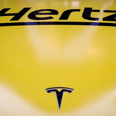 A Hertz Tesla electric vehicle is displayed during the Hertz Corporation IPO at the Nasdaq in New York