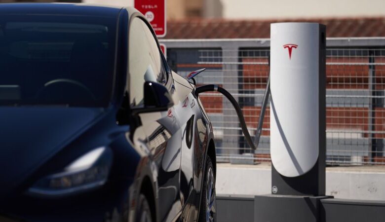 Tesla axes electric vehicle charging team Tesla axes electric vehicle charging team