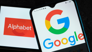 Alphabet Inc. (GOOG, GOOGL) and Google logos seen displayed on smartphones. The Google stock split is happening today.