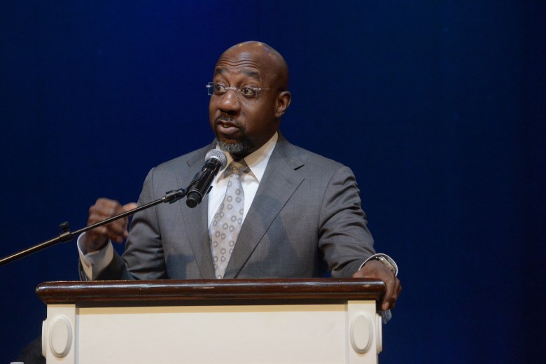 **FILE** U.S. Sens. Chris Van Hollen and Raphael Warnock (pictured) reintroduced legislation to help better protect seniors from financial securities fraud. (Roy Lewis/The Washington Informer)