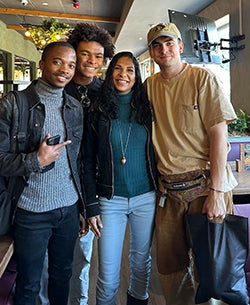 Leeds student Forrest Mondlane Jr. (second from left) helped South African entrepreneur Stacey Jane Smith (third from left) rebrand her personal care products. 