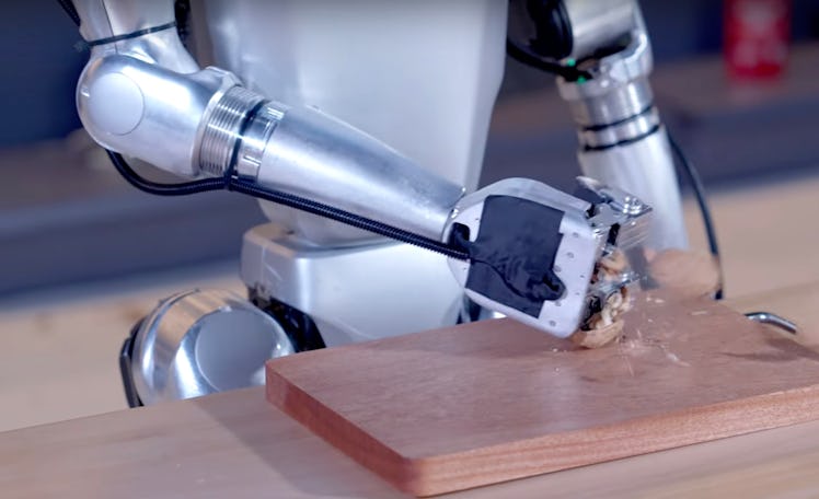 Unitree's G1 humanoid robot smashing a walnut.