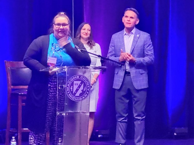 Therapist Stephanie Falotico accepts the Macomb Business Startup of the Year award for her Sterling Heights based Epoch Expressions therapy center.(PHOTO BY SUSAN SMILEY)