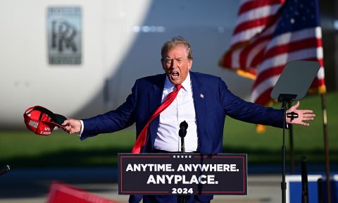 Trump warns of tax hikes, EV doom in Michigan rally. Here are the facts