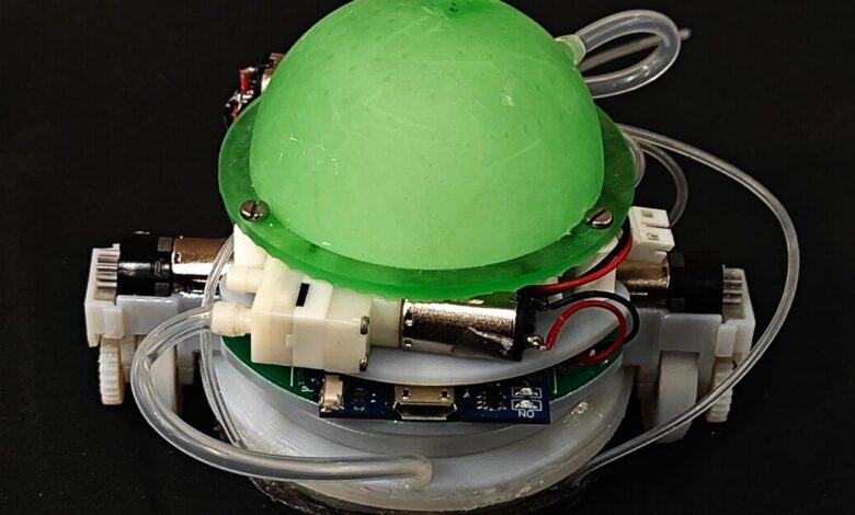 Slippery snail robot forgoes mucus for water to climb up walls Slippery snail robot forgoes mucus for water to climb up walls