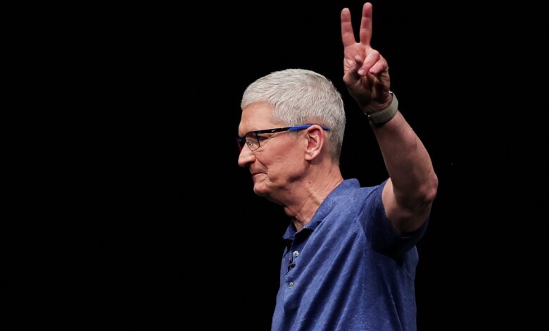 Apple shares close at record high after company unveils AI software Apple shares close at record high after company unveils AI software