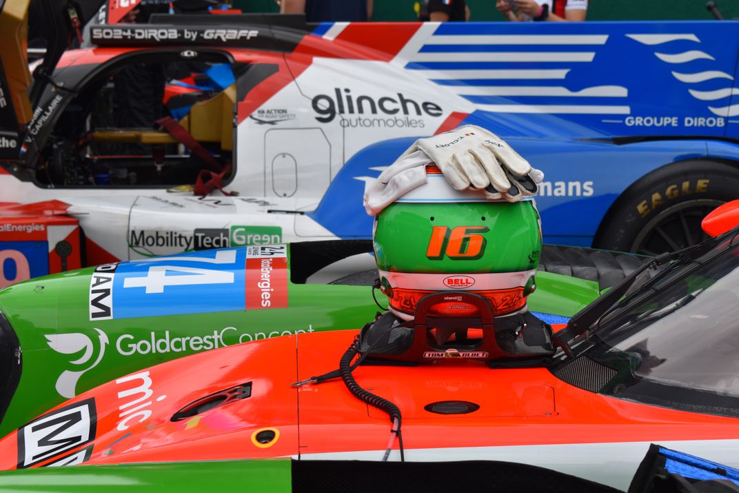 10 - Various race cars are lined up in a row during the 24 Hours of Le Mans, an annual endurance race in France, with participants and spectators traveling from all over the world.