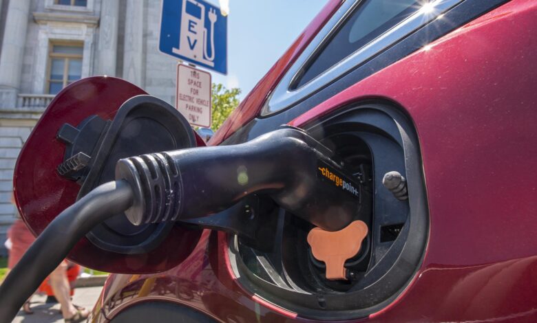 Phil Scott signs annual transportation bill with new fees on electric vehicles Phil Scott signs annual transportation bill with new fees on electric vehicles