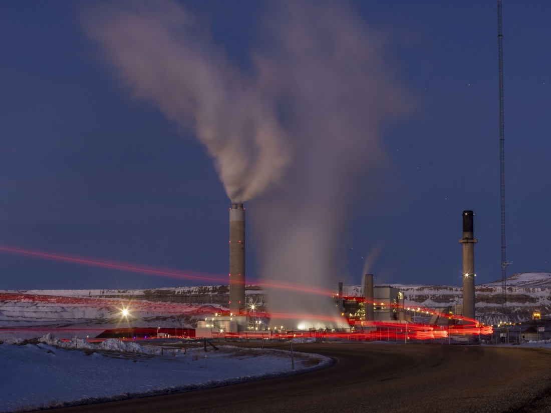 Taillights trace the path of a motor vehicle at the Naughton Power Plant, Jan. 13, 2022, in Kemmerer, Wyo. Bill Gates and his energy company are starting construction at their Wyoming site adjacent to the coal plant for a next-generation nuclear power plant he believes will “revolutionize” how power is generated. (AP Photo/Natalie Behring, File)