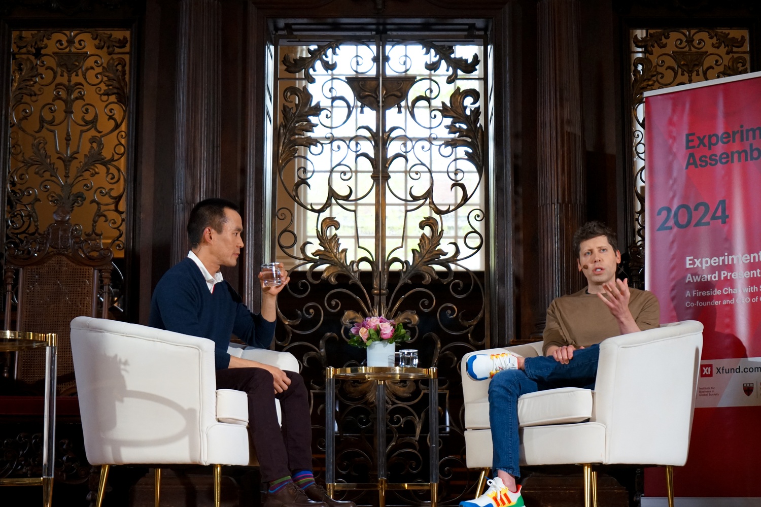 OpenAI CEO Sam Altman, right, speaks at a packed event in Memorial Church in May. The excitement surrounding Altman's visit to campus demonstrated broad interest in artificial intelligence from the student body.