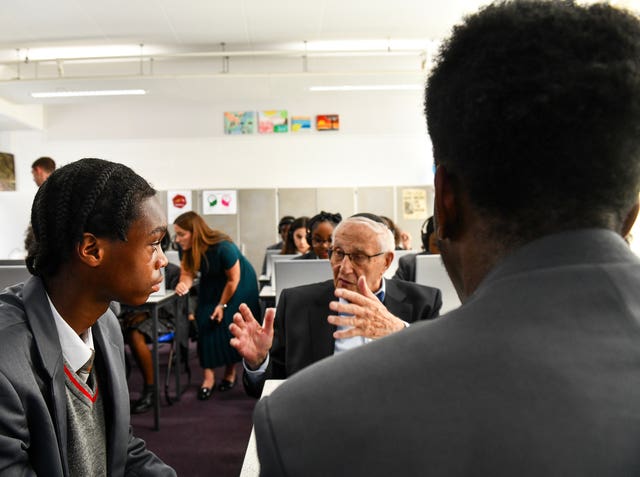 Students at Sacred Heart Catholic School listen to Manfred Goldberg, a holocaust survivor and the first survivor to feature in Testimony 360 