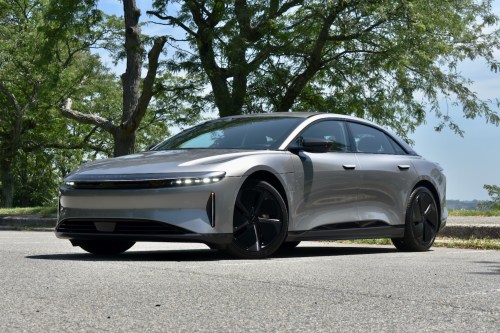 Front three quarter view of a beige 2024 Lucid Air Touring.