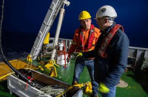 Jill Heinerth The team prepares to launch the side-scan sonar to search for Quest