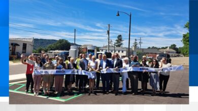 Officials cut ribbon on city’s first electric vehicle chargers