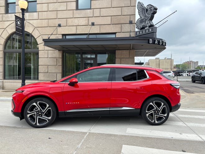 The 2024 Chevrolet Equinox EV has a long, low profile.