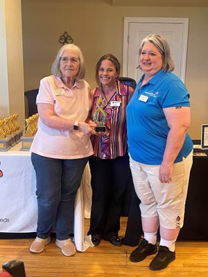 The Nourish Award and a $5,000 Grant was presented at the nonprofits annual fundraising golf tournament at the Rochester Country Club. Pictured here are Jean Parson, Board President, Monarch School; Andrea Pruna, Chief Growth Officer, Northeast CU; and Jeanete Southern, Executive Director, Monarch School.