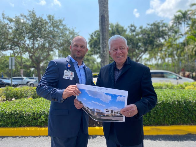 HCA Palms West CEO Jason Kimbrell and Mike Pugh, the hospital's first CEO, met last month to unveil plans for a new $80 million robotics tower.