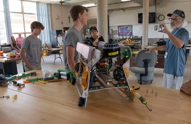 Catholic High School Robotics Team member Ace London discusses the team's planned trip to Tennessee for the MATE ROV world championship robotics competition with Pensacola News Journal Reporter Troy Moon on Friday, June 14, 2024.